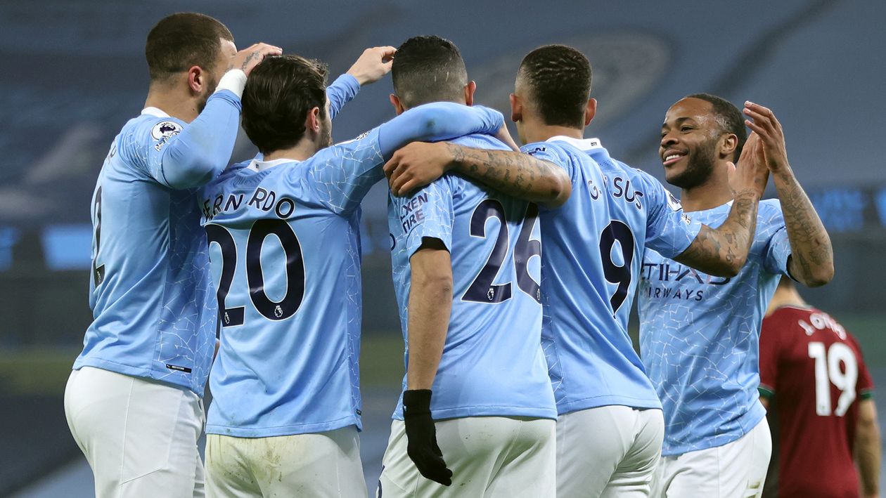 Manchester City celebrate a goal against Wolves