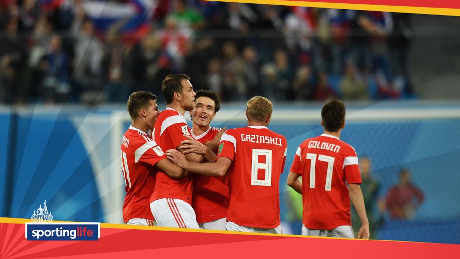 Russia celebrate scoring against Egypt