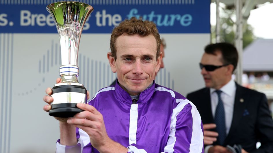 Ryan Moore celebrates with the Yorkshire Oaks trophy