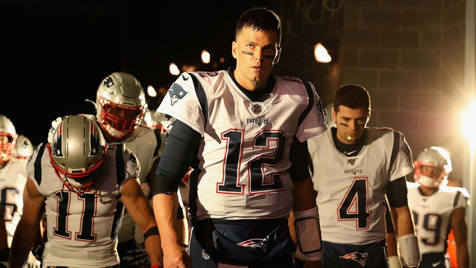 New England Patriots quarterback Tom Brady leading his team in the NFL