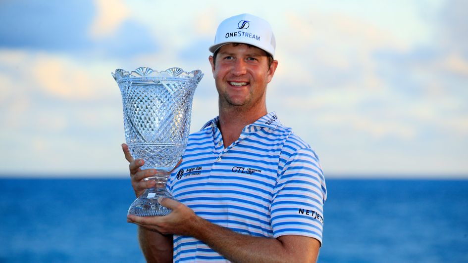 Hudson Swafford poses with the trophy after victory at the Corales Puntacana Resort & Club Championship
