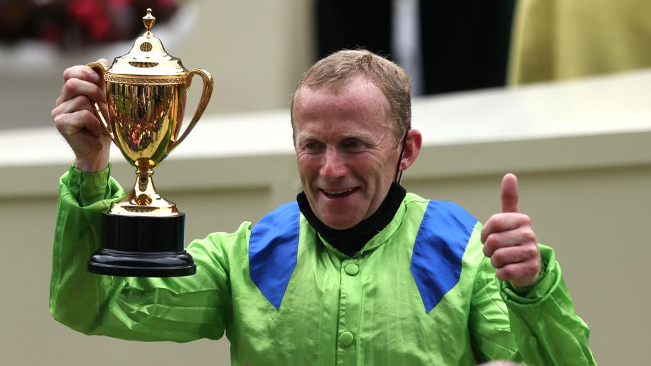 Joe Fanning celebrates with the Gold Cup at Royal Ascot