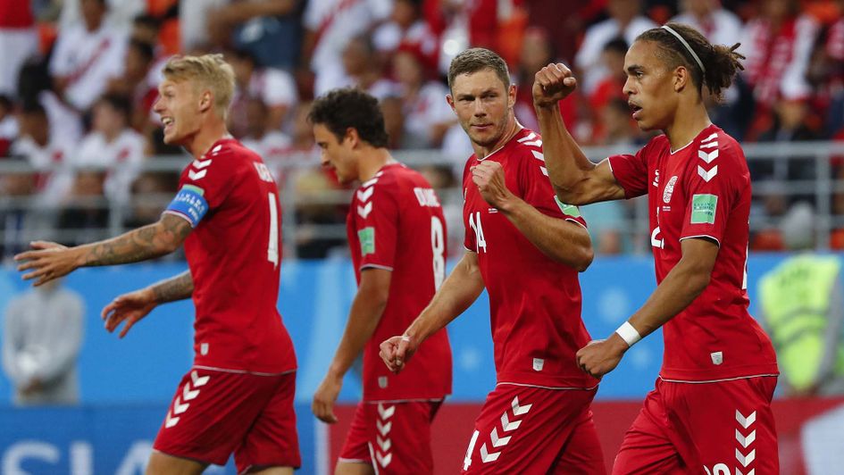 Denmark celebrate their goal against Peru