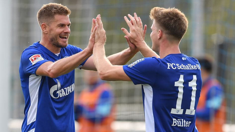 Simon Terodde and Marius Bülter in action for Schalke