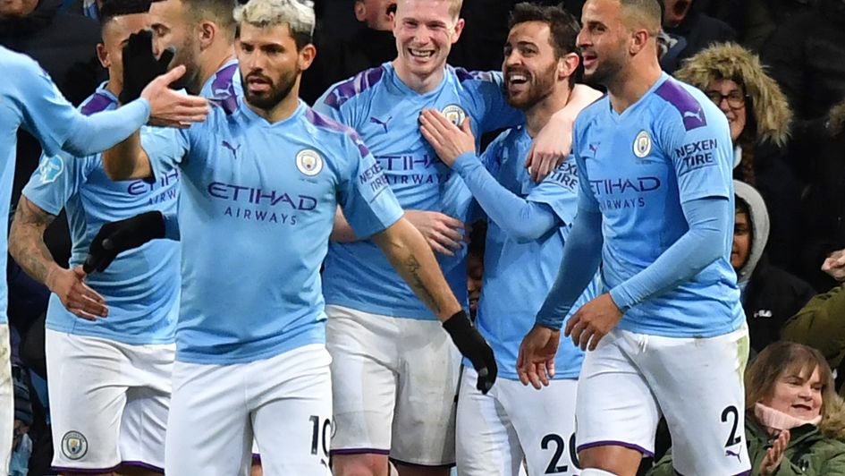 Kevin De Bruyne celebrates with his Manchester City team mates