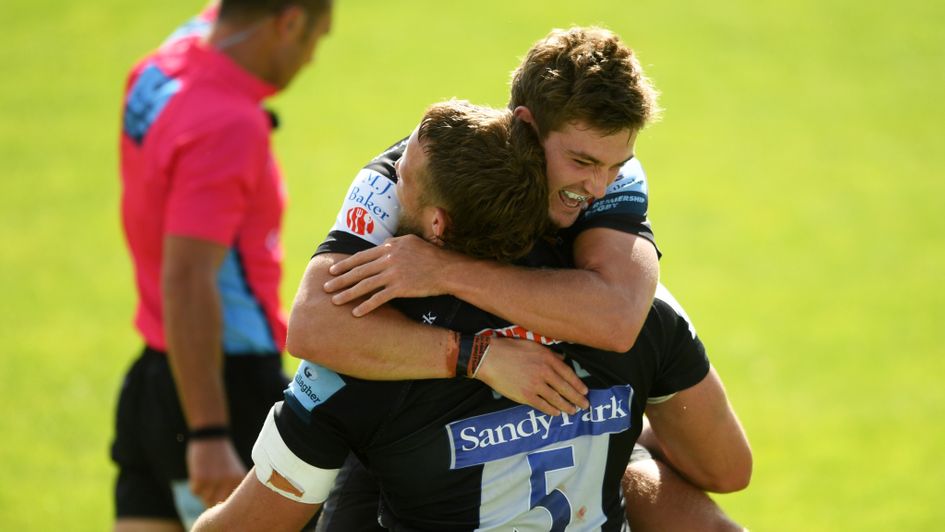 Jonny Hill of Exeter celebrates with Jack Maunder during their thrashing of Worcester