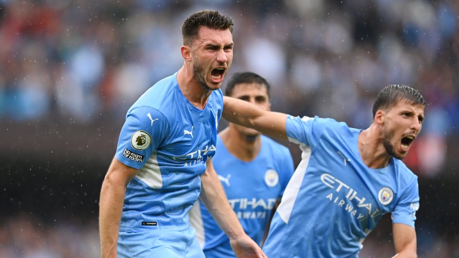 Manchester City's Aymeric Laporte and Ruben Dias celebrate
