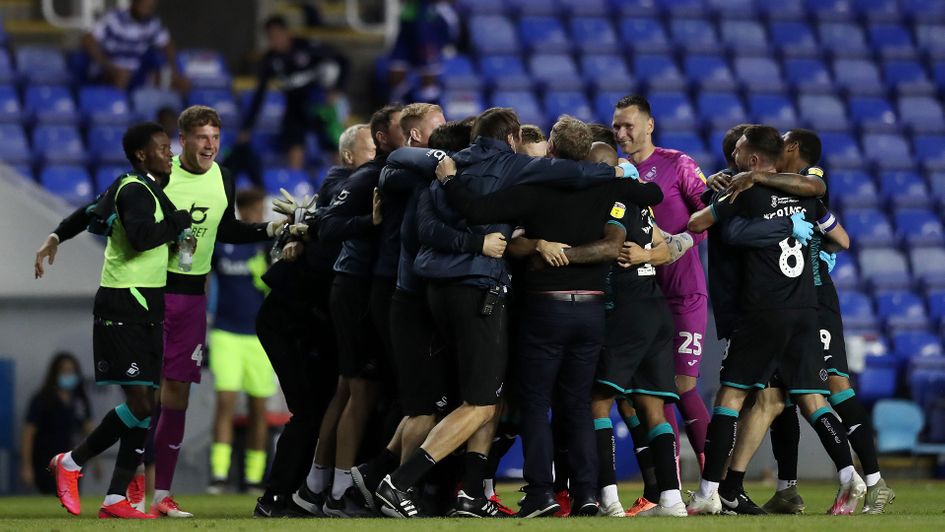 Swansea players celebrate reaching the play-offs