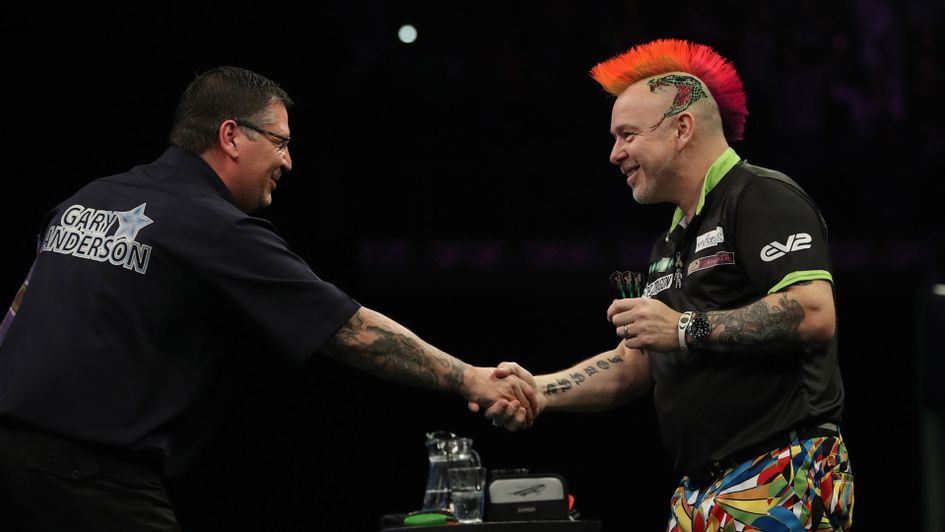 Gary Anderson and Peter Wright shake hands after an epic encounter (Pic: Lawrence Lustig/PDC)