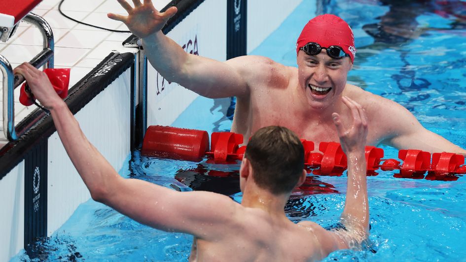 Tom Dean and Duncan Scott celebrate their one-two at the Olympics