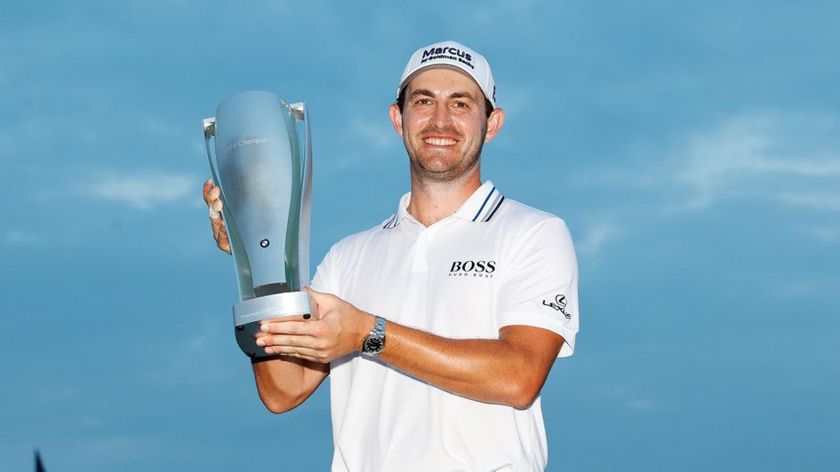 Patrick Cantlay celebrates with the BMW Championship Trophy