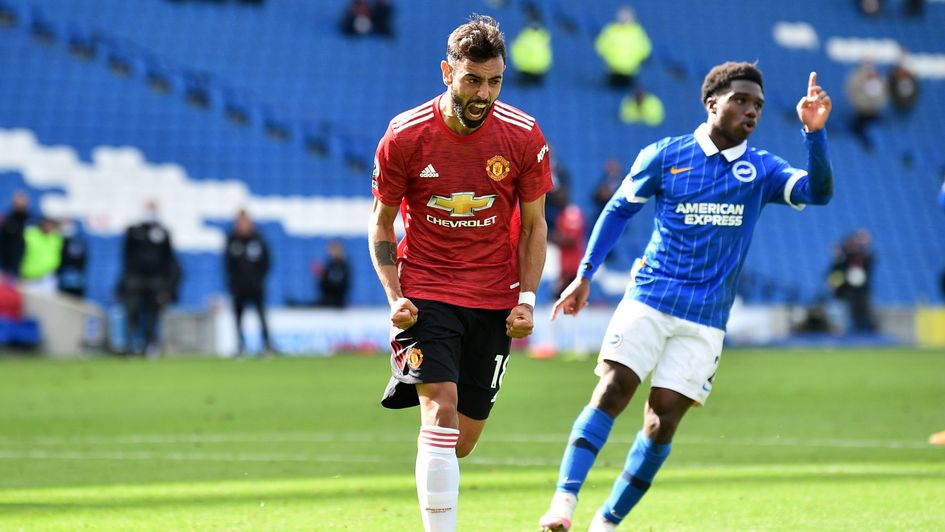 Manchester United's Bruno Fernandes celebrates after scoring deep in injury time at Brighton