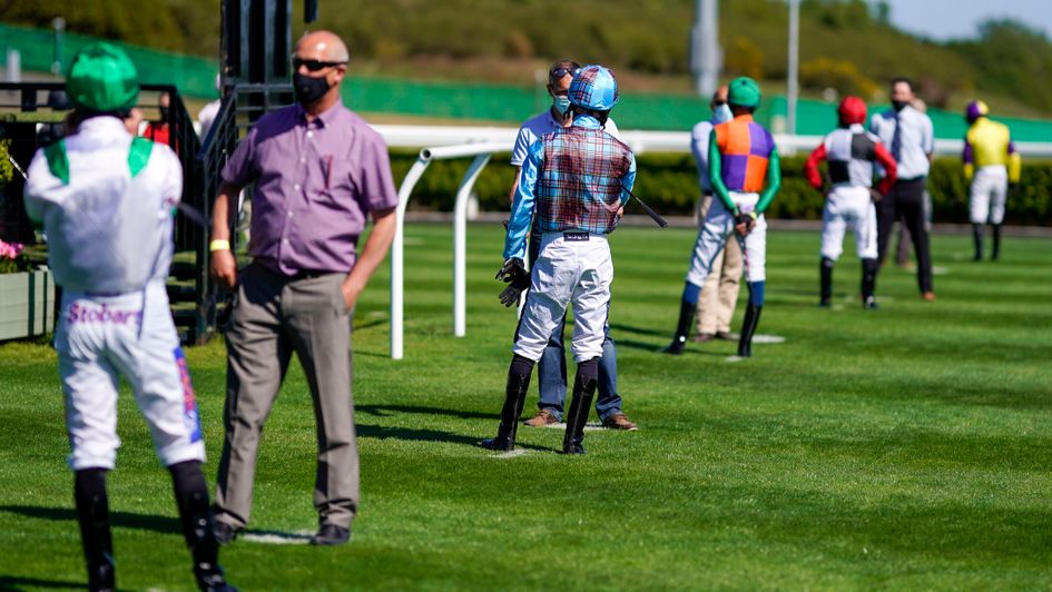 Jockeys adhere to social distancing measures at Newcastle