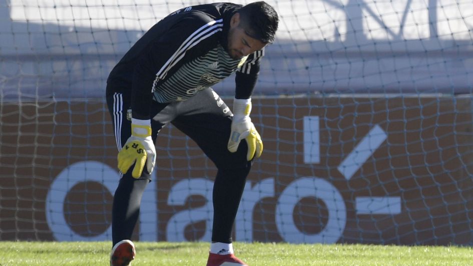 Sergio Romero stretches during a training session with Argentina