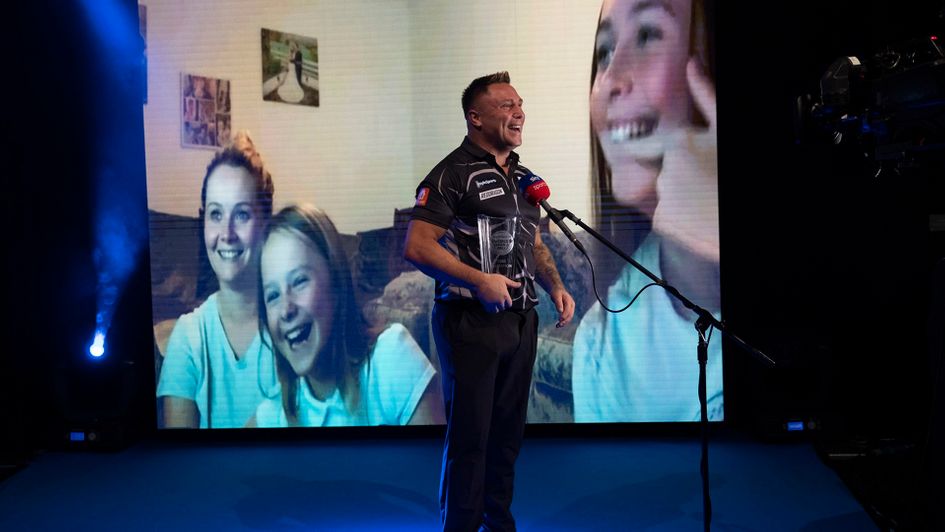 Gerwyn Price and his family on the big screen after winning the World Grand Prix (Picture: Lawrence Lustig/PDC)