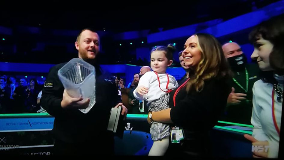 Mark Allen shares a memorable moment with his family