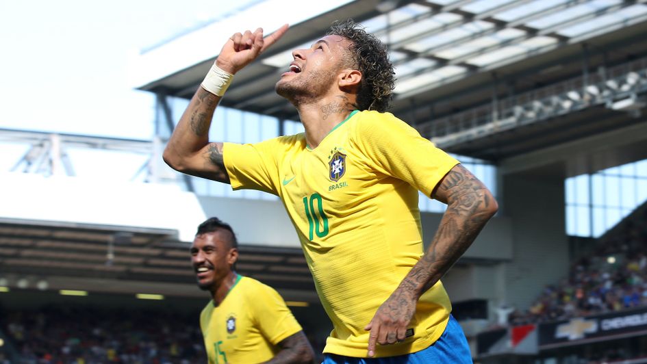 Neymar celebrates after scoring for Brazil at Anfield
