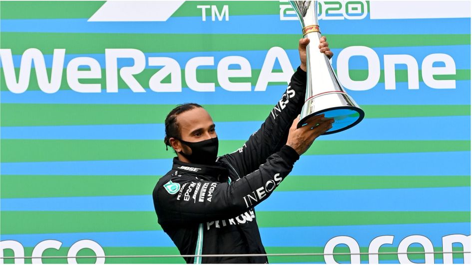 Lewis Hamilton celebrates winning the Hungarian GP