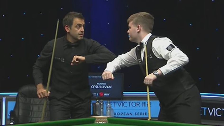O'Sullivan and Hill touch elbows