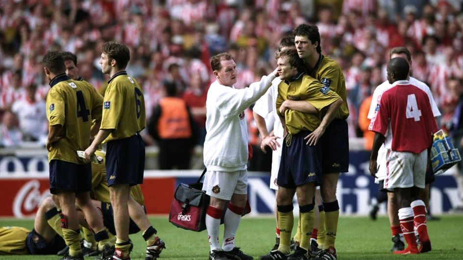 Michael Gray is comforted by team-mates after losing the 1998 play-off final