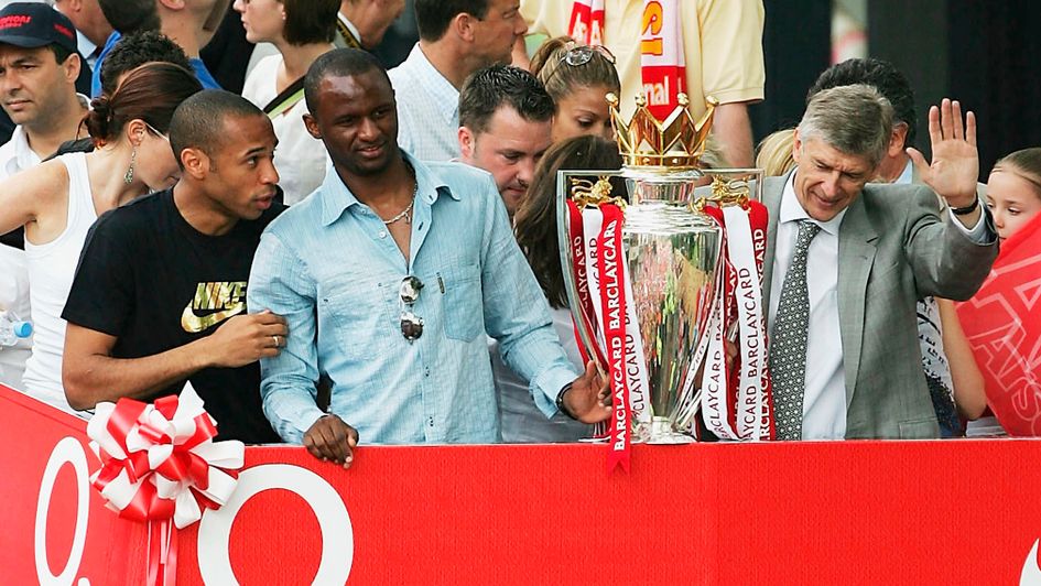 Left to right: Thierry Henry, Patrick Vieira and Arsene Wenger with the Premier League trophy in 2004