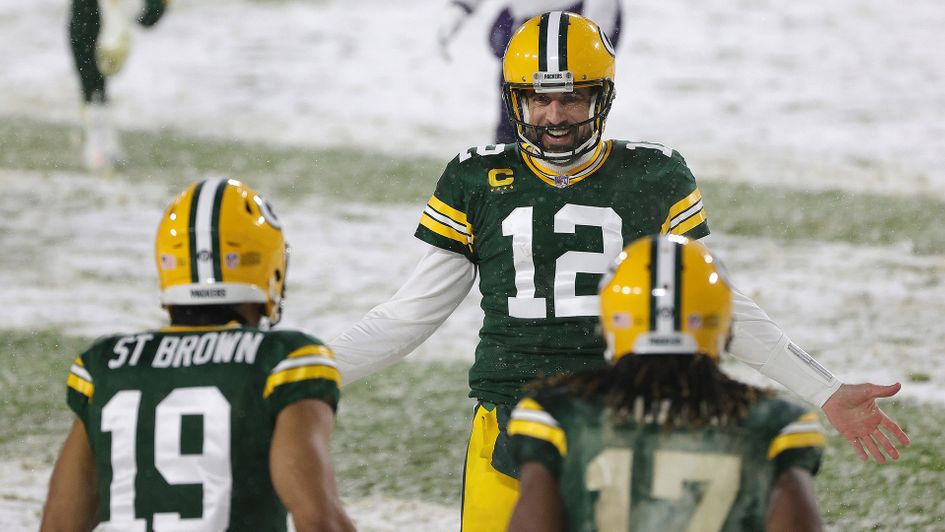 Aaron Rodgers celebrates a touchdown